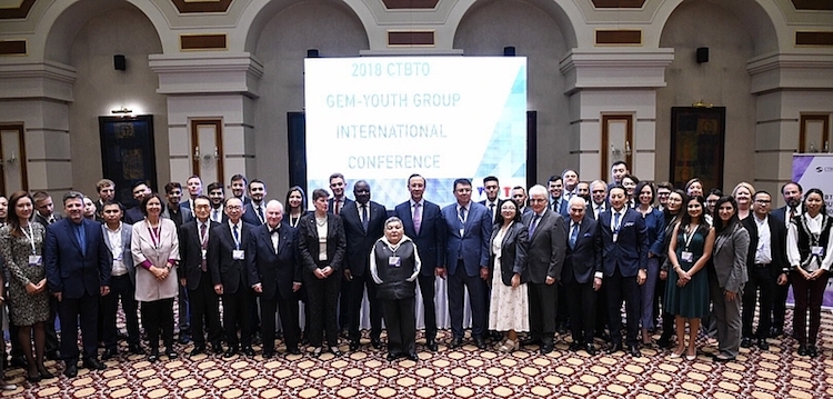 Photo: Participants of the 2018 CTBTO GEM – Youth International Conference in Astana. In the front is ATOM Project leader, Honorary Ambassador and artist Karipbek Kuyukov. Behind him: Kazakh Foreign Minister Kairat Abdrakhmanov (on the right) and CTBTO Executive Secretary Dr Lassina Zerbo (on the left). Credit: CTBTO. 