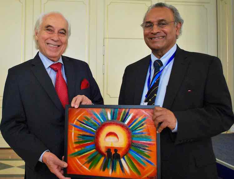 Photo: Sergio Duarte, incoming President of Pugwash and his predecessor Jayantha Dhanapala, who headed the organisation for ten years, with a painting by Kazakh artist and anti-nuclear activist Karipbek Kuyukov in Astana end of August 2017. Credit: Pugwash