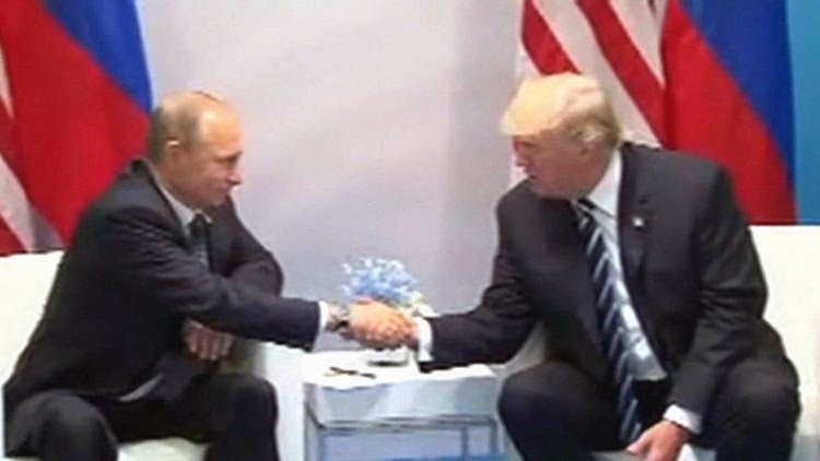 Photo: President Trump Meets with President Putin at G20 summit in Hamburg, Germany. July 7, 2017. Credit: YouTube