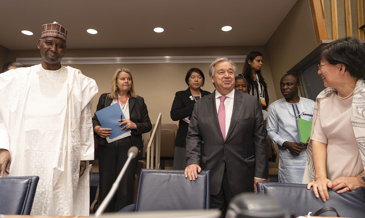 Photo: Secretary-General António Guterres (fourth from left) and Tijjani Muhammad-Bande (left), President of the seventy-fourth session of the General Assembly, attend the high-level plenary meeting of the General Assembly to commemorate and promote the International Day for the Total Elimination of Nuclear Weapons. Credit: UN Photo/Rick Bajornas. 26 September 2019.